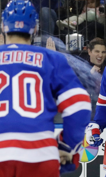 Lundqvist ties Plante on NHL wins list, Rangers beat Canucks